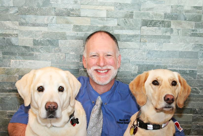 Dr. Kerr with two dogs